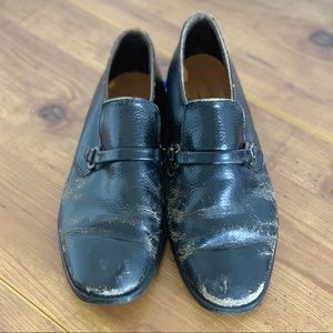 Distressed buckle loafers